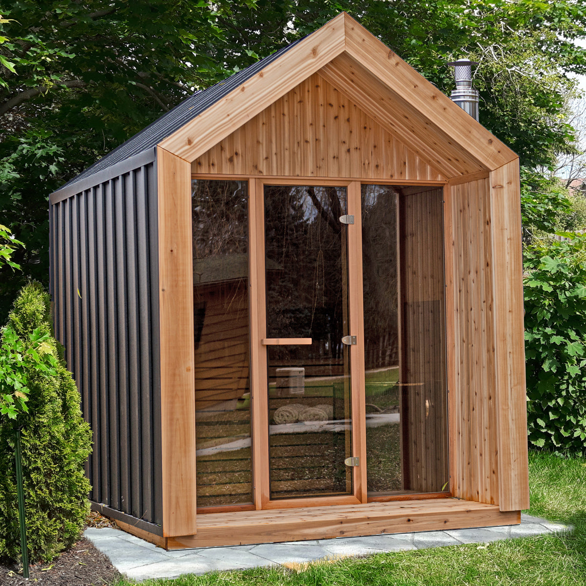 Outdoor sauna with Apex roof in garden setting